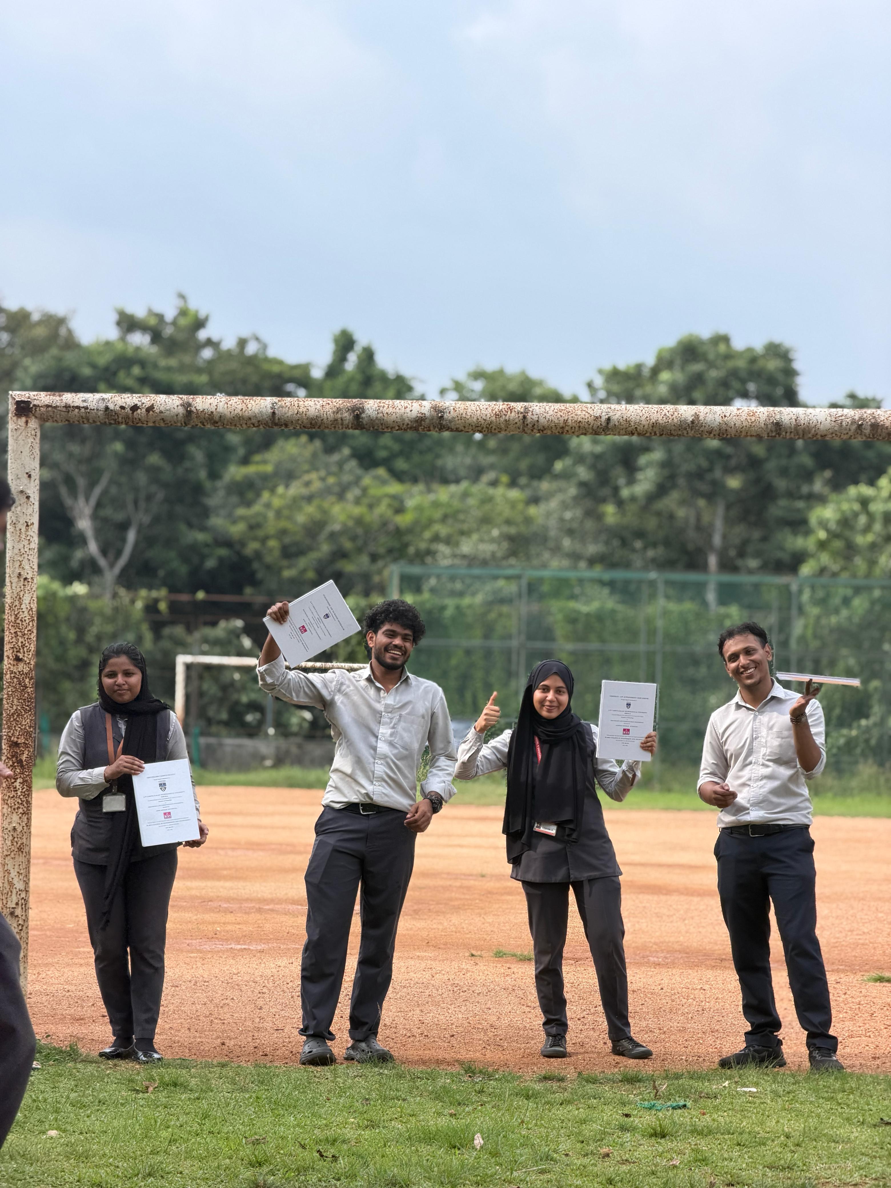 Students celebrating a project milestone together